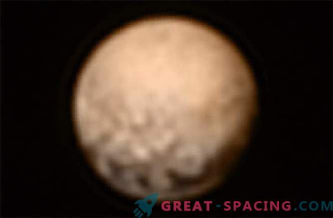 La nave revivida de la misión New Horizons envía una foto de Plutón